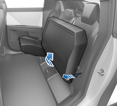 Cojín de asiento trasero plegado hacia arriba para maximizar el espacio de carga.