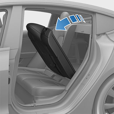 One rear seat folded forward with arrow pointing down