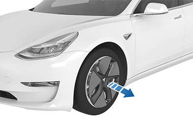 Tapacubos con una flecha apuntando en dirección opuesta al neumático