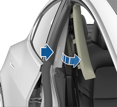 Arrow pointing to the VIN location with interior trim removed.