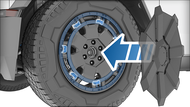 L'enjoliveur de roue avec une flèche pointant vers l'intérieur, vers la roue