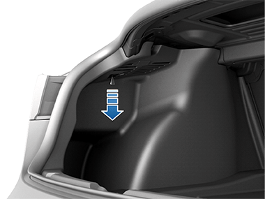 câble de déverrouillage avec une flèche pointant vers le bas.