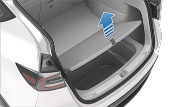 Rear trunk with arrow pointing upwards from cargo cover strap