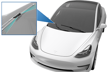 Detalle ampliado de los chorros del lavaparabrisas apuntando a la parte inferior de la escobilla del limpiaparabrisas