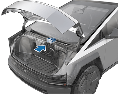 The front of the vehicle with the hood open and an `arrow pointing to the low voltage battery