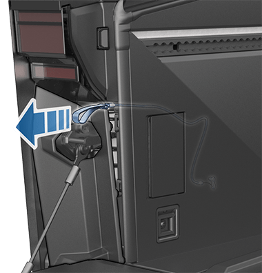 câble de déverrouillage mis en évidence en bleu.