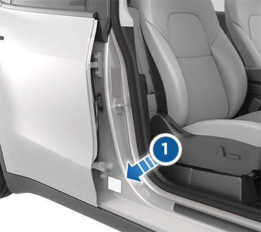 乘客侧中门柱上的标签，指示车辆的承载重量