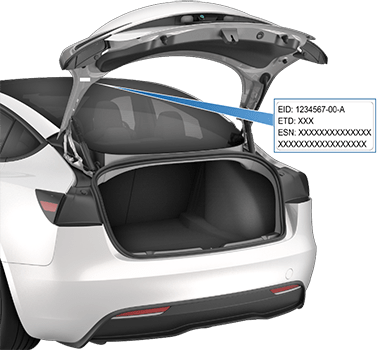 后备箱开启，箭头指示掀背车门上的标签