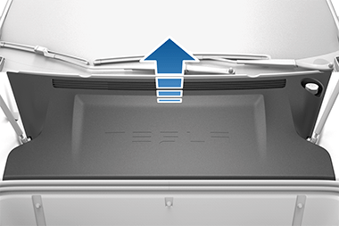 청색 화살표가 위를 가리키는 전면 트렁크 액세스 패널