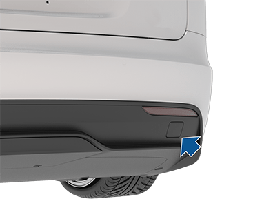 车辆后部，以及一个箭头，指向后牵引环位置。