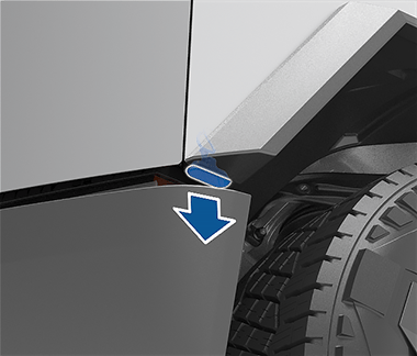 Front of vehicle shown with an arrow showing how to remove the front trunk access terminal cover.