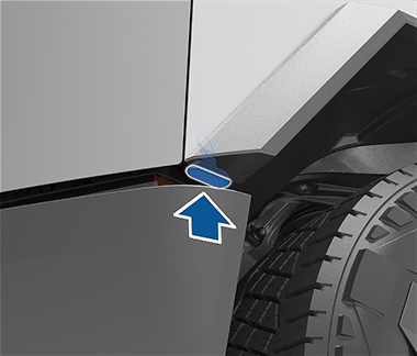 Front of vehicle shown with an arrow showing how to replace the front trunk access terminal cover.