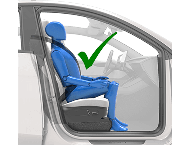 발을 바닥에 두고 앉아 있는 사람 및 녹색 확인 표시